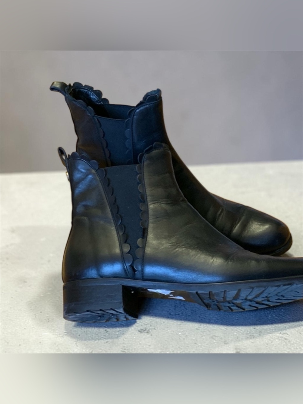 Browns Couture Women’s Black Leather Ankle Booties with Scallop Trim